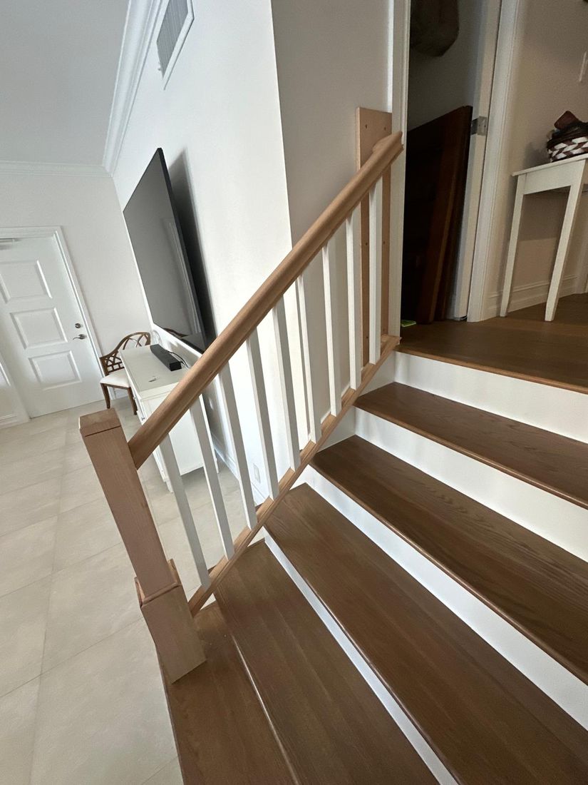Solid wood staircase with railing