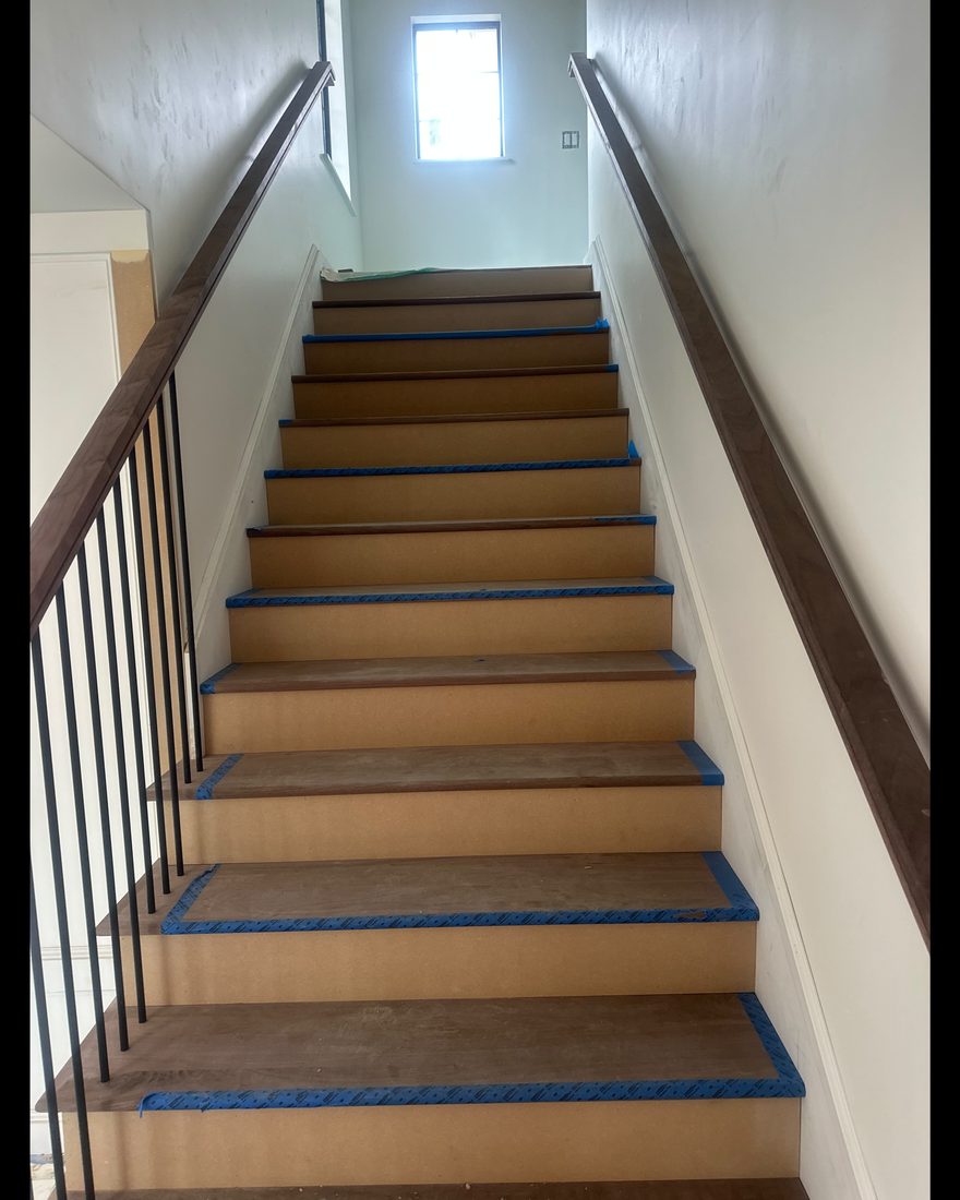 Solid wood staircase with railing
