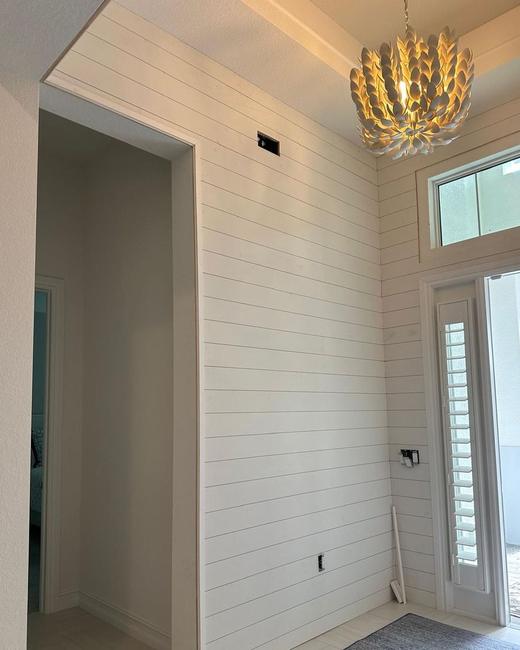 White shiplap entry — Aguilar Home Solutions, Southwest Florida