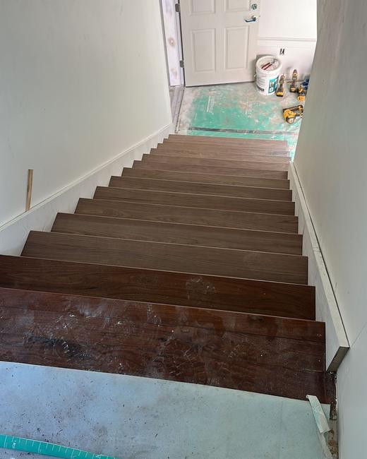 Walnut treads & iron balusters — Aguilar Home Solutions, Southwest Florida